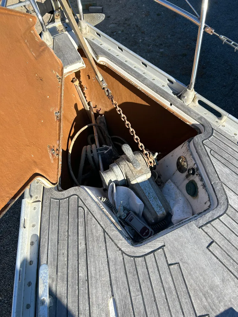 Slide: The Image of Anchor locker of 1986 Wauquiez Centurion 47 sailboat with chain and equipment. - 13