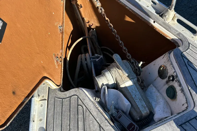 Slide: The Image of Anchor locker of 1986 Wauquiez Centurion 47 sailboat with chain and winch. - 19
