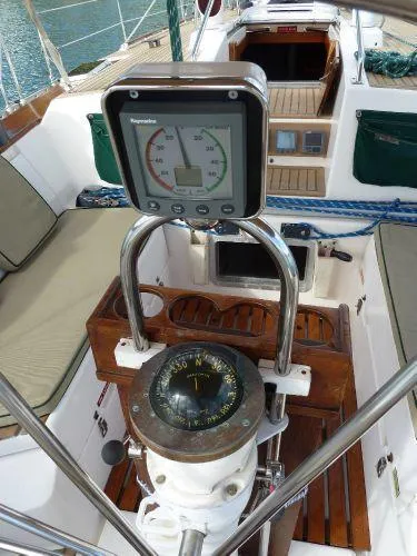 Slide: The Image of Cockpit of 1986 Wauquiez Centurion 47 sailboat with compass and navigation instruments. - 3