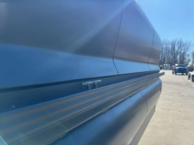 Slide: The Image of 2025 Manitou Navigator side view with sleek design and metallic finish. - 5