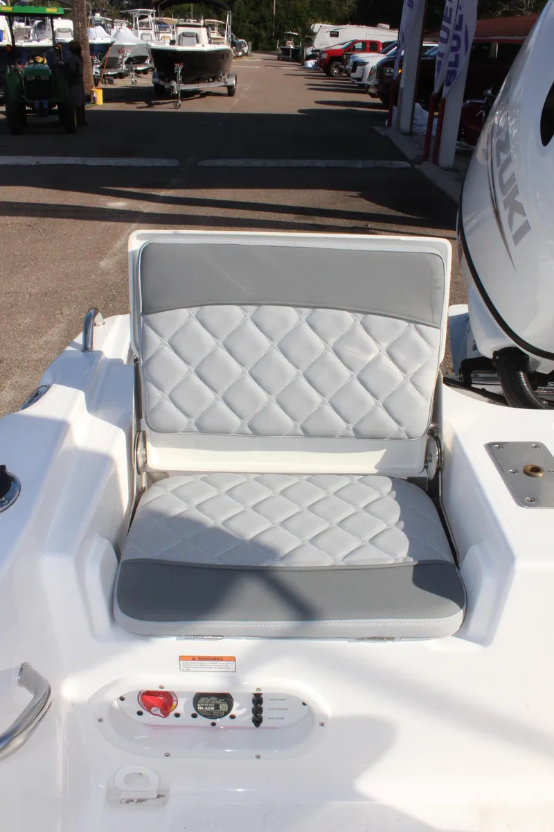 Slide: The Image of 2025 NauticStar 191 Hybrid boat seat with quilted design and control panel. - 12