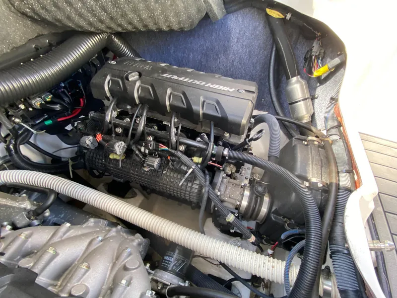 Slide: The Image of Engine compartment of 2018 Yamaha Boats 242 Limited S, showcasing detailed components. - 15