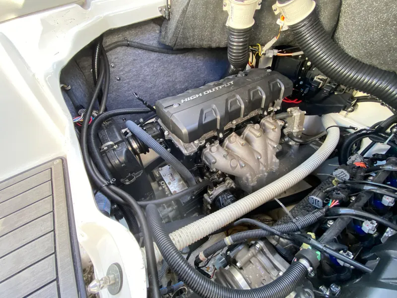 Slide: The Image of Engine compartment of 2018 Yamaha Boats 242 Limited S, showcasing high output engine components. - 16