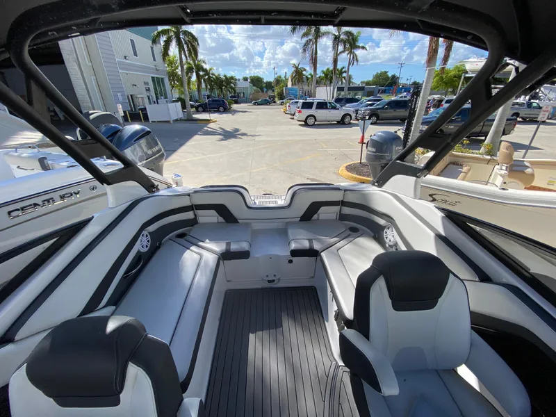 Slide: The Image of 2018 Yamaha Boats 242 Limited S interior with sleek seating and modern design. - 7