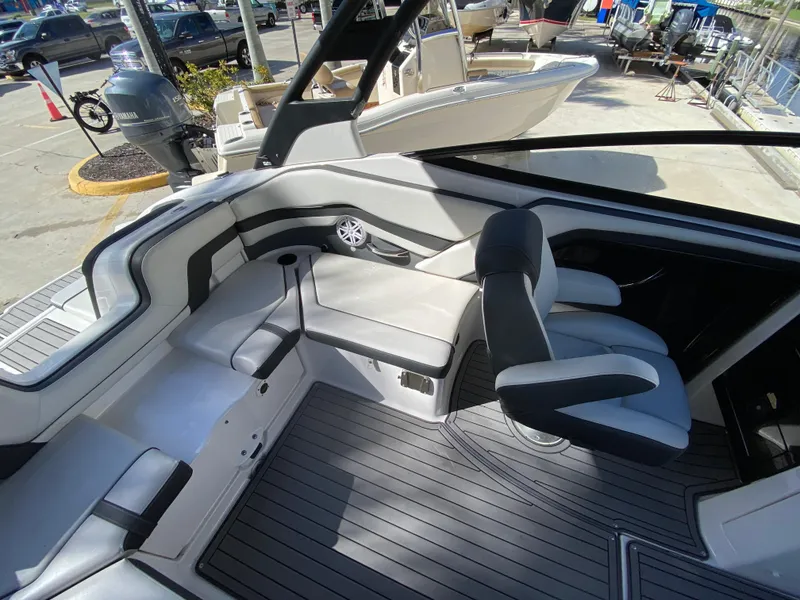 Slide: The Image of Interior of 2018 Yamaha Boats 242 Limited S, featuring sleek seating and modern design. - 8