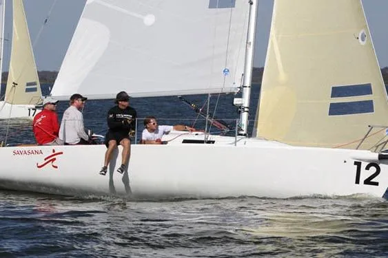 Slide: The Image of Sailing on a 2026 J Boats J/80, crew navigating calm waters. - 6
