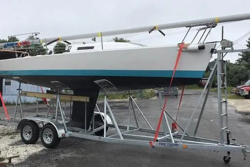 Slide: The Image of 2026 J Boats J/80 sailboat on trailer, ready for transport. - 7