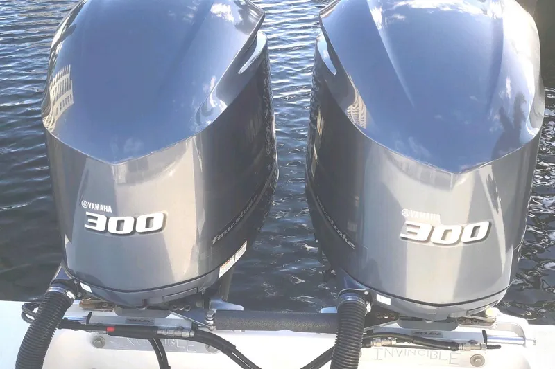 Slide: The Image of Twin Yamaha 300 engines on 2017 Invincible 33 Open Fisherman boat. - 10