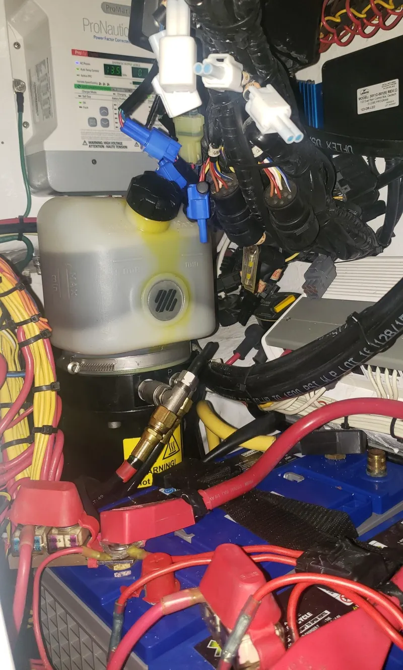 Slide: The Image of Electrical and mechanical components inside a 2017 Invincible 33 Open Fisherman boat. - 18