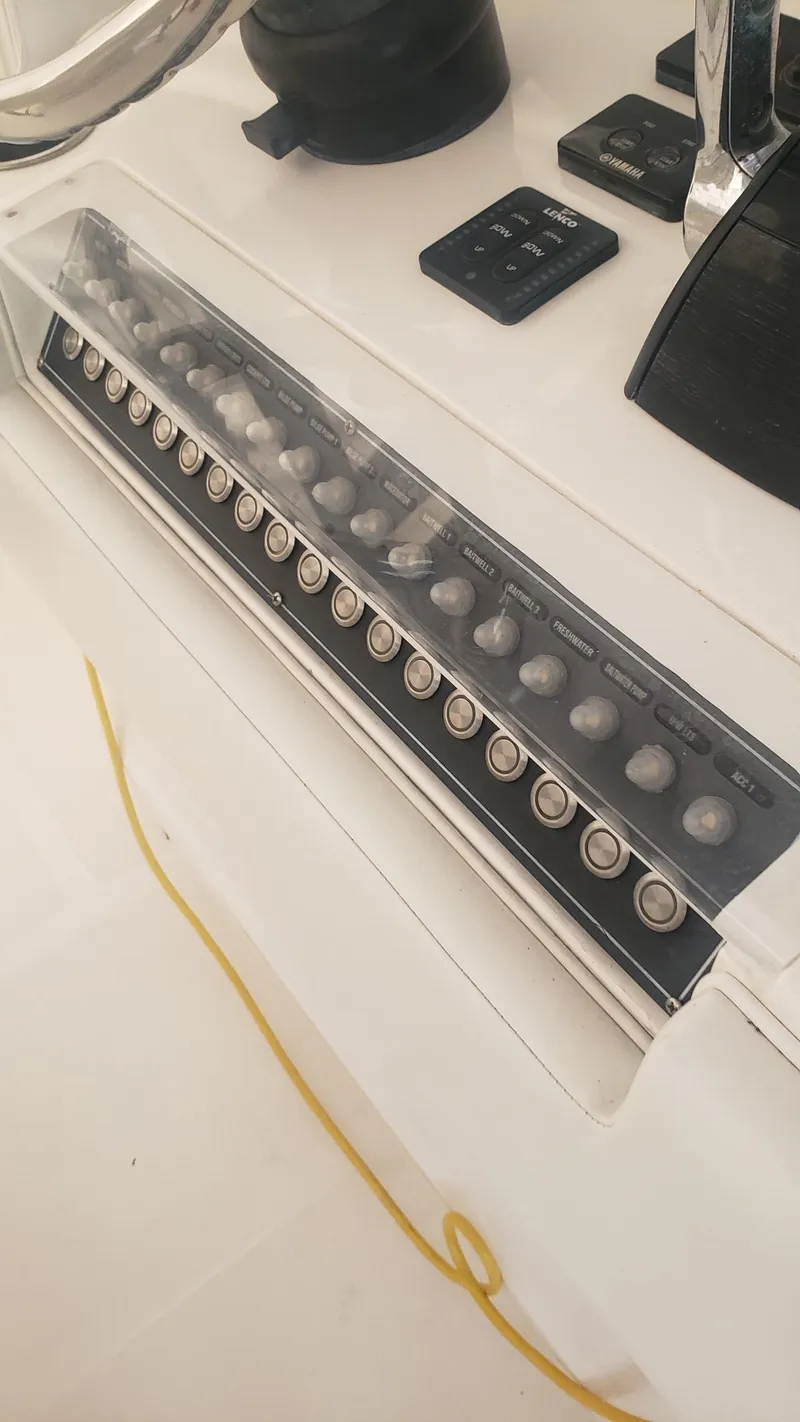 Slide: The Image of Control panel of a 2017 Invincible 33 Open Fisherman boat. - 36