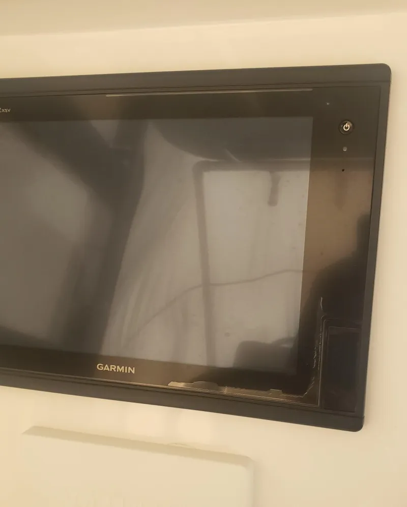 Slide: The Image of Garmin display on 2017 Invincible 33 Open Fisherman boat dashboard. - 38