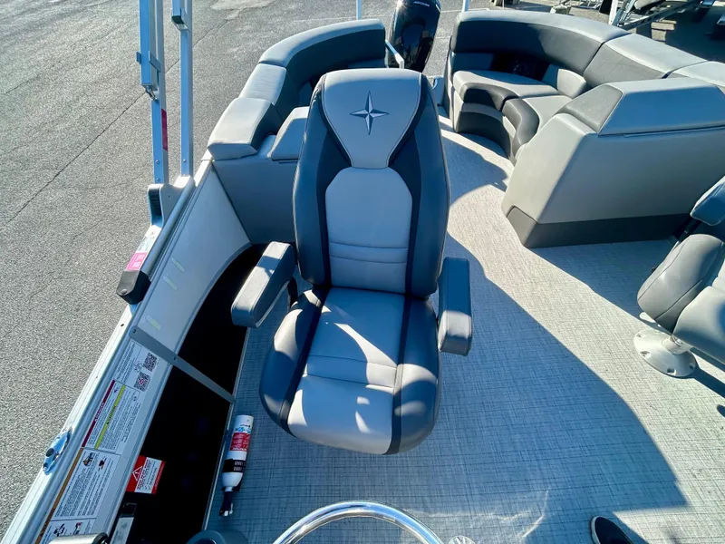 Slide: The Image of 2024 Berkshire 23RFX STS 3.0 boat interior with luxurious seating and modern design. - 11