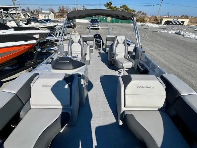 Slide: The Image of 2024 Berkshire 23RFX STS 2.75 pontoon boat with spacious seating and modern design. - 16