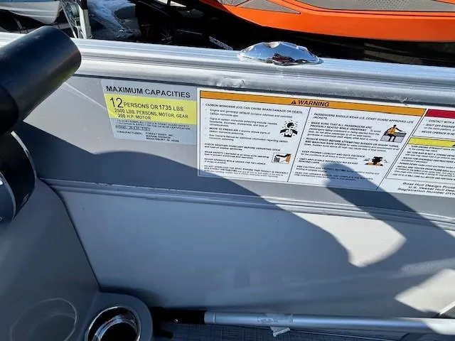 Slide: The Image of 2024 Berkshire 23RFX STS 2.75 capacity label, maximum 12 persons or 1735 lbs. - 19