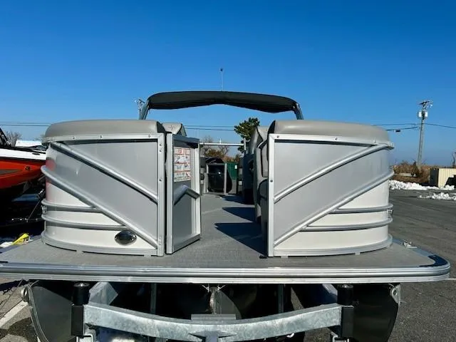 Slide: The Image of 2024 Berkshire 23RFX STS 2.75 pontoon boat, silver exterior, parked outdoors. - 3
