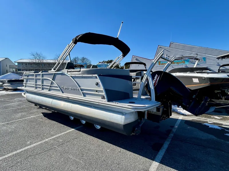 Slide: The Image of 2024 Berkshire 23RFX STS 2.75 pontoon boat parked outdoors. - 4