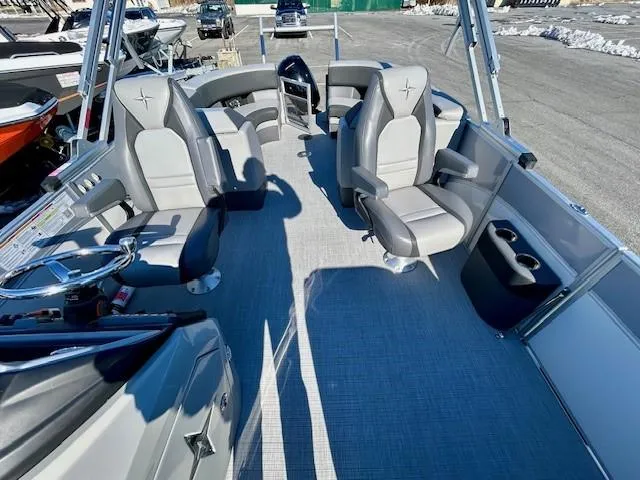 Slide: The Image of 2024 Berkshire 23RFX STS 2.75 boat interior with gray seating and modern design. - 6