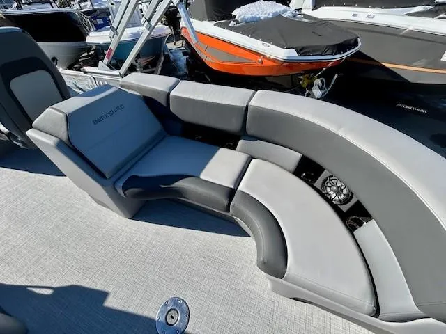 Slide: The Image of 2024 Berkshire 23RFX STS 2.75 boat interior with sleek gray seating. - 7