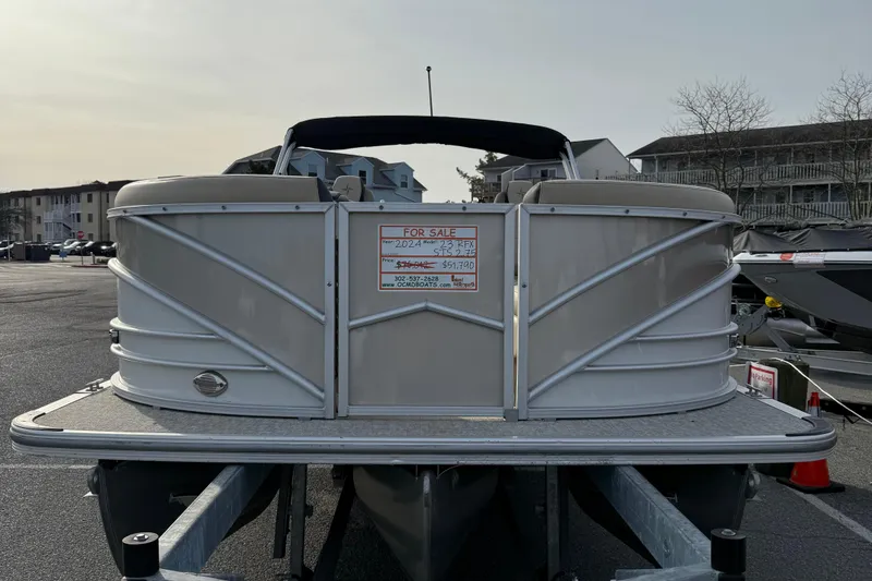 Slide: The Image of 2024 Berkshire 23RFX STS pontoon boat for sale in a parking lot. - 12