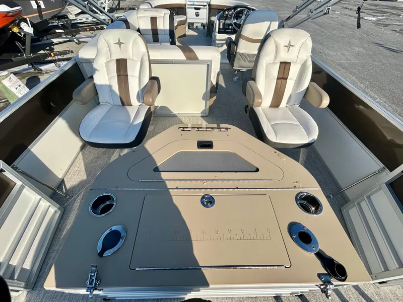 Slide: The Image of 2024 Berkshire 24RFC CTS 2.75 boat interior with plush seating and modern design. - 8