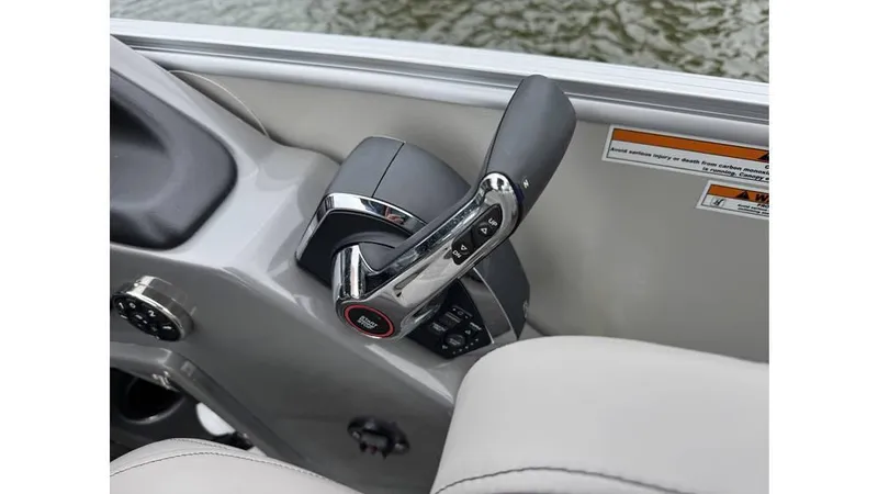 Slide: The Image of Throttle control of 2023 Avalon 2585 VRB boat, featuring sleek design and chrome accents. - 13