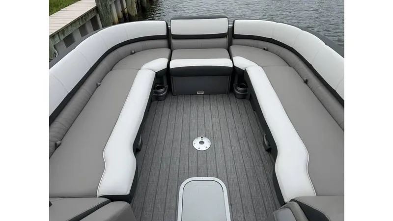 Slide: The Image of Luxurious seating on 2023 Avalon 2585 VRB pontoon boat, featuring gray and white upholstery. - 15
