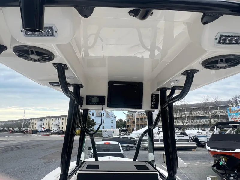 Slide: The Image of 2024 Sea Born LX24 LE boat interior with modern electronics and speakers. - 10