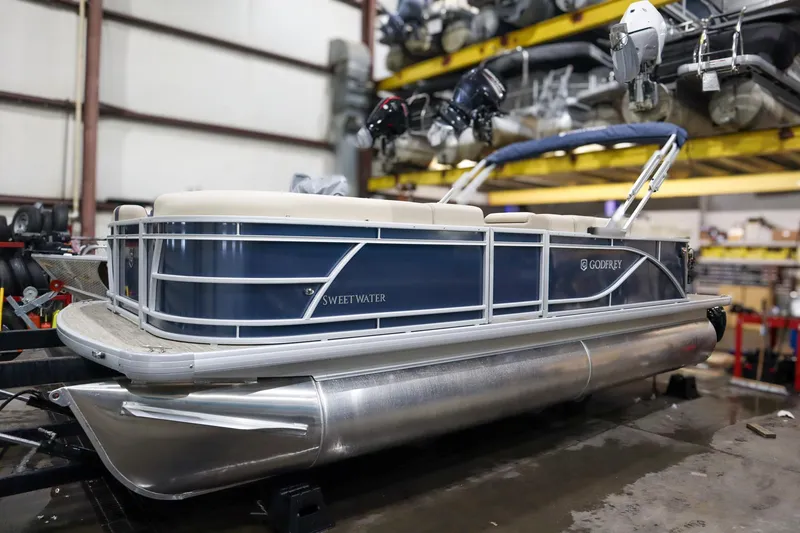 The Image of 2025 Godfrey Sweetwater 2086 C pontoon boat in a workshop setting. - 0