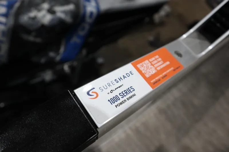 Slide: The Image of SureShade 1000 Series Power Bimini label on Godfrey Sweetwater 2086 C, 2025 model. - 13