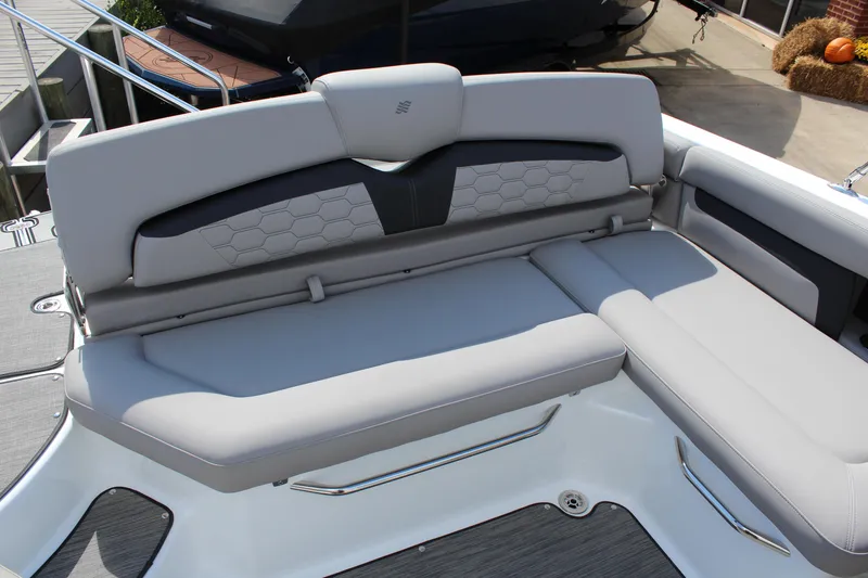 Slide: The Image of 2025 Four Winns HD3 boat interior with sleek, modern seating design. - 7