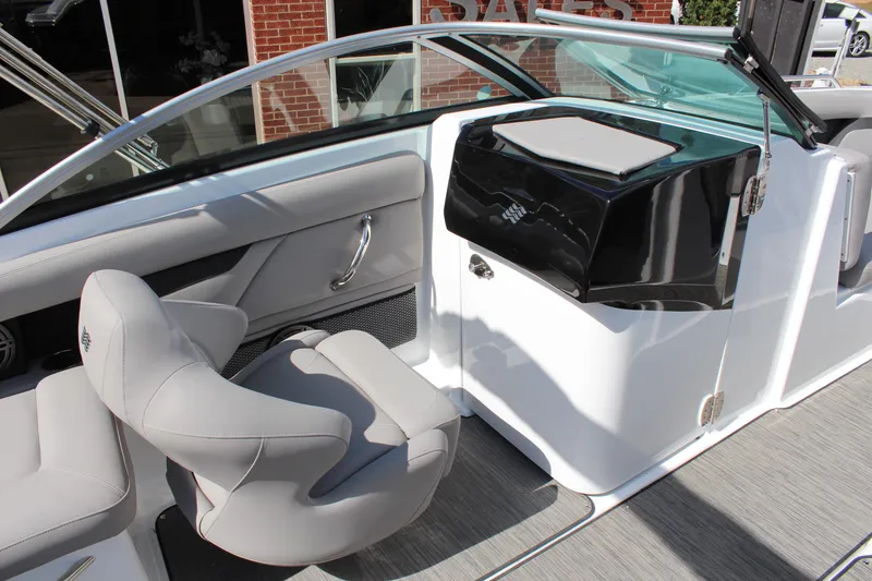 Slide: The Image of 2025 Four Winns HD3 boat interior with sleek seating and modern dashboard design. - 8