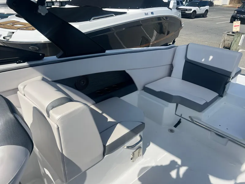 Slide: The Image of 2024 Scarab 255 ID boat interior with modern seating and sleek design. - 6