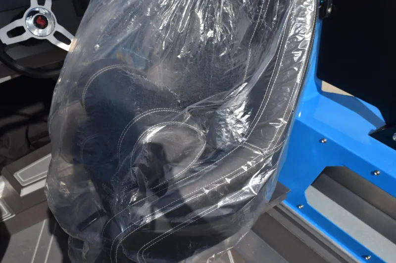 Slide: The Image of 2024 Stabicraft 1850 Fisher Sportfish seat covered in protective plastic. - 12
