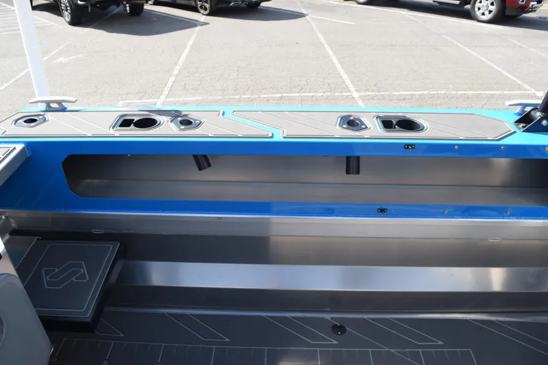 Slide: The Image of 2024 Stabicraft 1850 Fisher Sportfish interior with rod holders and storage compartments. - 19