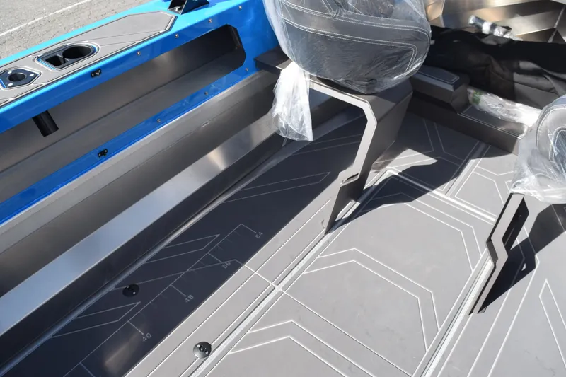 Slide: The Image of 2024 Stabicraft 1850 Fisher Sportfish interior with modern seating and sleek design. - 21