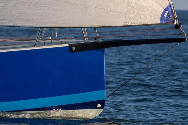 Slide: The Image of 2026 J Boats J/99 sailboat with blue hull on the water. - 6