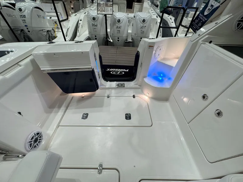 Slide: The Image of 2025 Pursuit OS 405 Offshore boat on calm water, aerial view. - 6