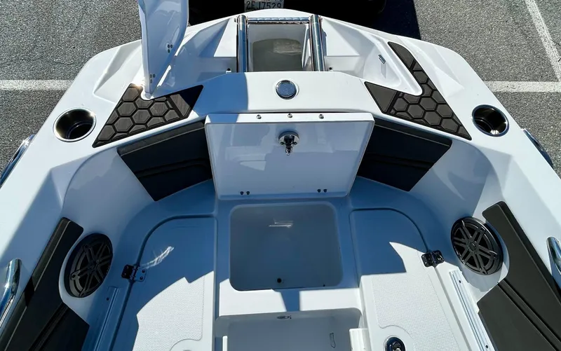 Slide: The Image of 2024 Scarab 255 Open boat interior with seating and storage compartments. - 11