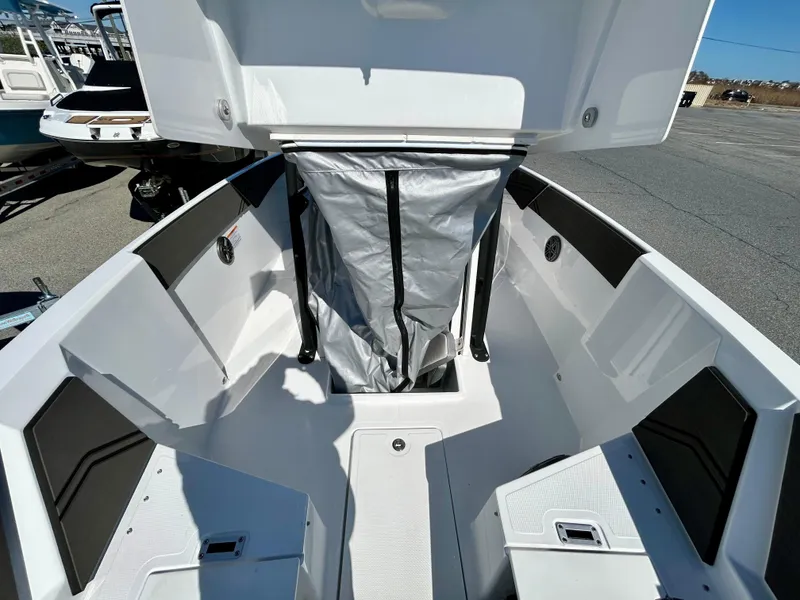 Slide: The Image of 2024 Scarab 255 Open boat interior with storage compartment and seating. - 9
