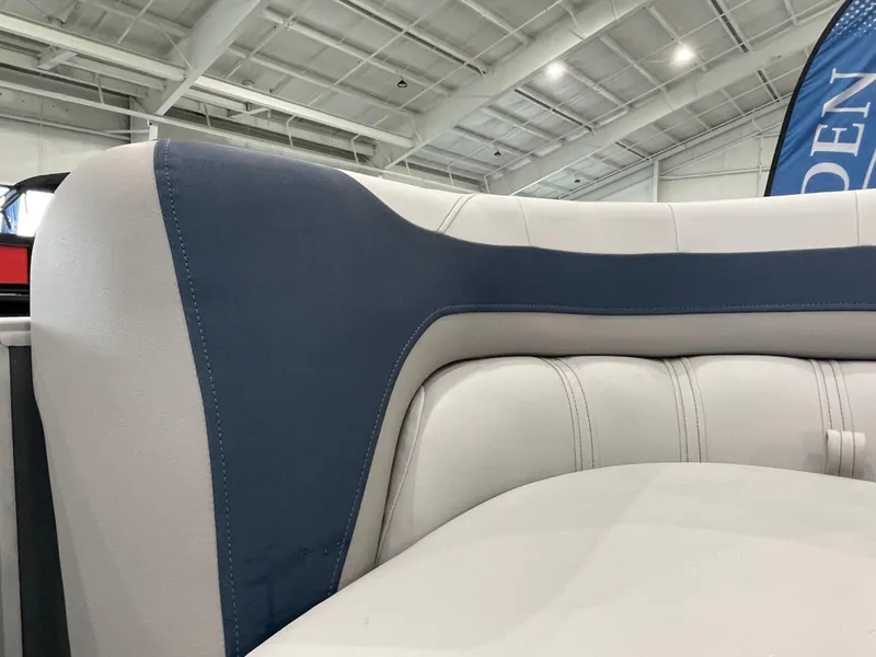 Slide: The Image of 2025 Godfrey Sweetwater 2086 C boat interior with blue and white upholstery. - 13
