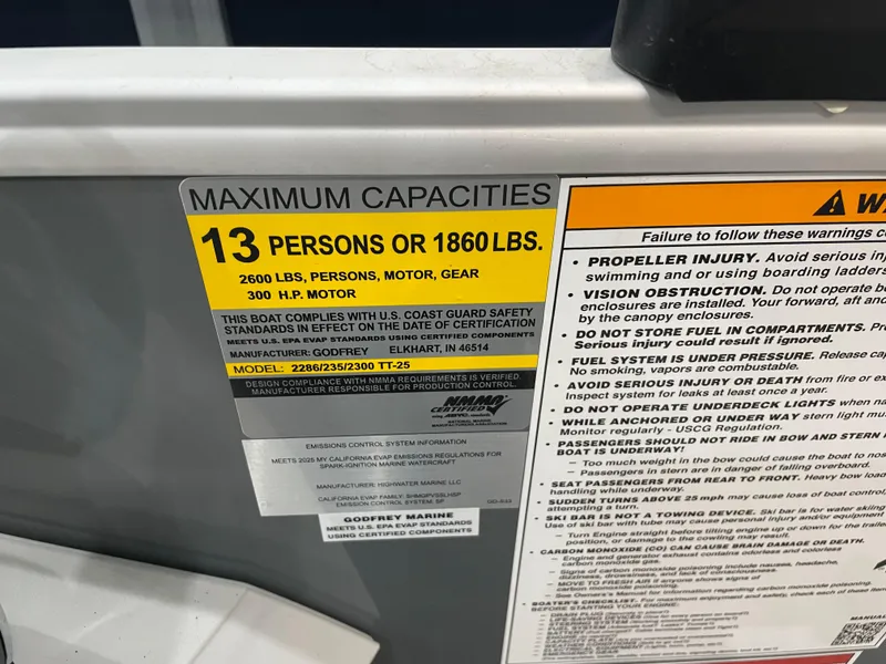 Slide: The Image of Capacity label on 2025 Godfrey Sweetwater 2086 C boat, max 13 persons or 1860 lbs. - 15