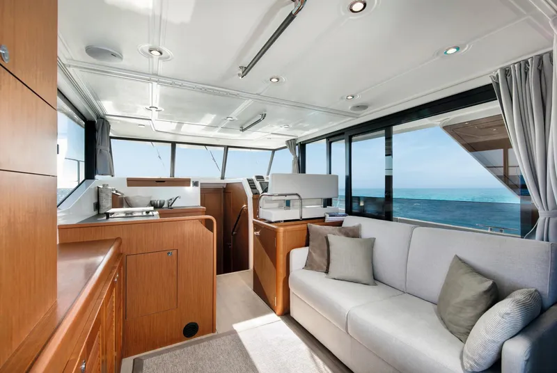 Slide: The Image of Interior of 2023 Beneteau Swift Trawler 35, featuring modern design and ocean view. - 6