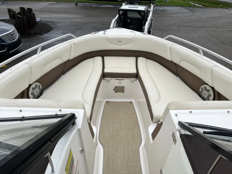 Slide: The Image of 2014 Chaparral 257 SSX boat with spacious, cushioned bow seating area. - 4