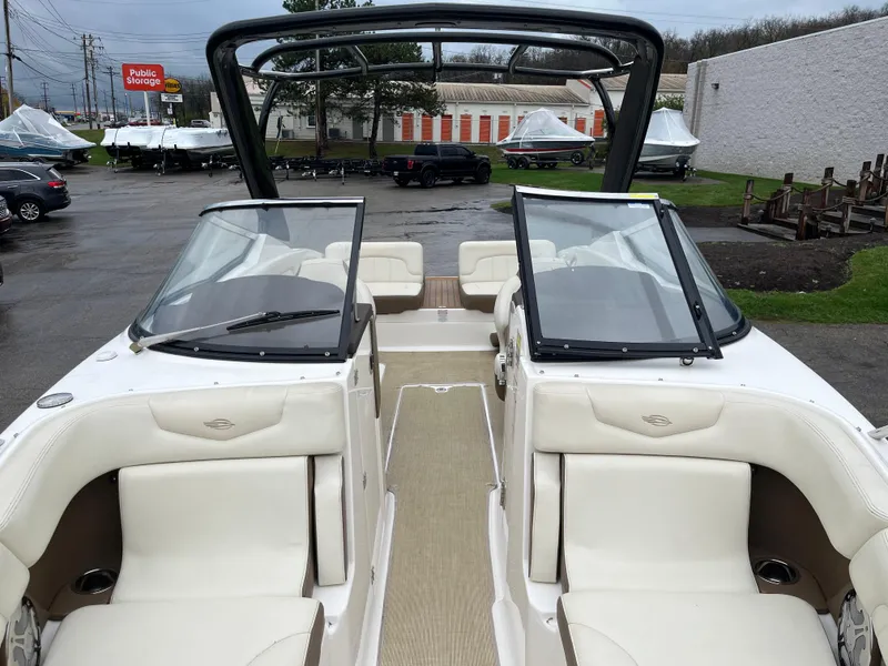 Slide: The Image of 2014 Chaparral 257 SSX boat with open seating and dual windshields. - 5