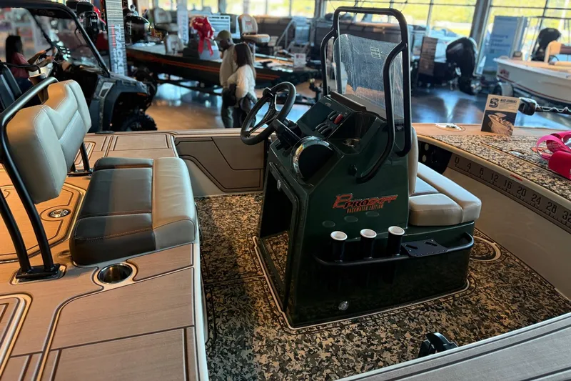 Slide: The Image of 2025 Mako 18 Pro Skiff Backwater Edition interior with seating and console. - 3