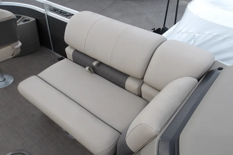 Slide: The Image of 2025 Sun Tracker Fishin' Barge 22 XP3, beige seating, comfortable and spacious design. - 13