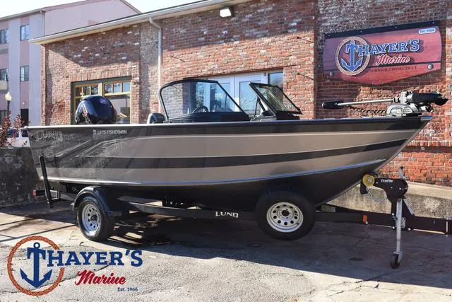 Slide: The Image of 2023 Lund 1875 Fisherman Sport boat at Thayer's Marine dealership. - 1