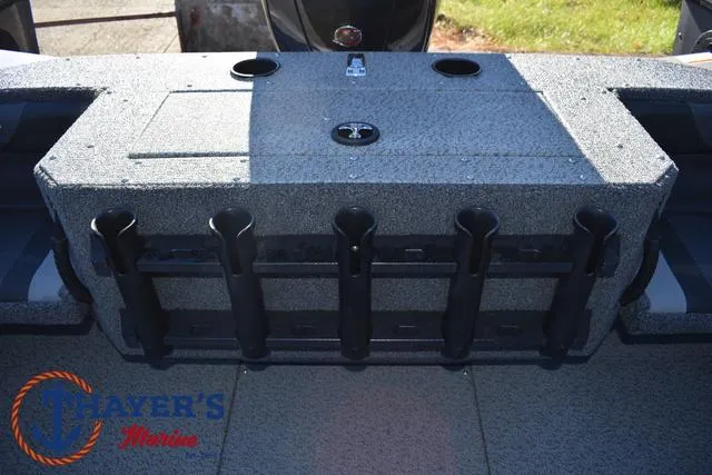 Slide: The Image of 2023 Lund 1875 Fisherman Sport boat interior with rod holders and storage. - 21