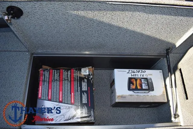 Slide: The Image of Storage compartment in 2023 Lund 1875 Fisherman Sport boat with electronics and equipment. - 23