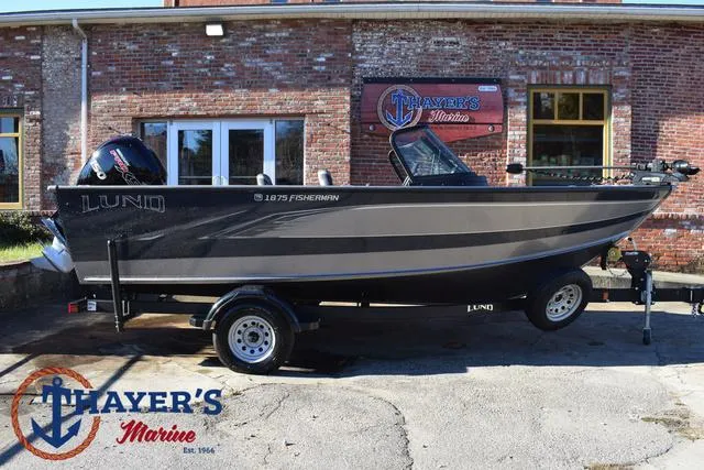 Slide: The Image of 2023 Lund 1875 Fisherman Sport boat displayed at Thayer's Marine dealership. - 36